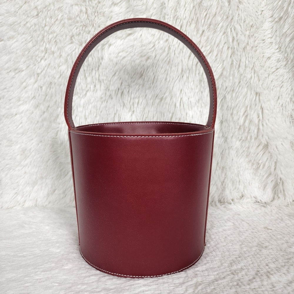 STAUD Bissett Bucket Bag with Strap in Deep Red